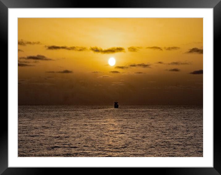 Ship Sailing into Sunset Framed Mounted Print by chris hyde