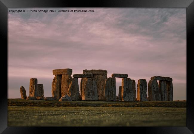 Stonehenge Winter Pink Sunset  Framed Print by Duncan Savidge