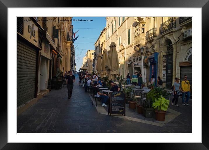 Sunday evening dining in Valletta Framed Mounted Print by Jim Jones