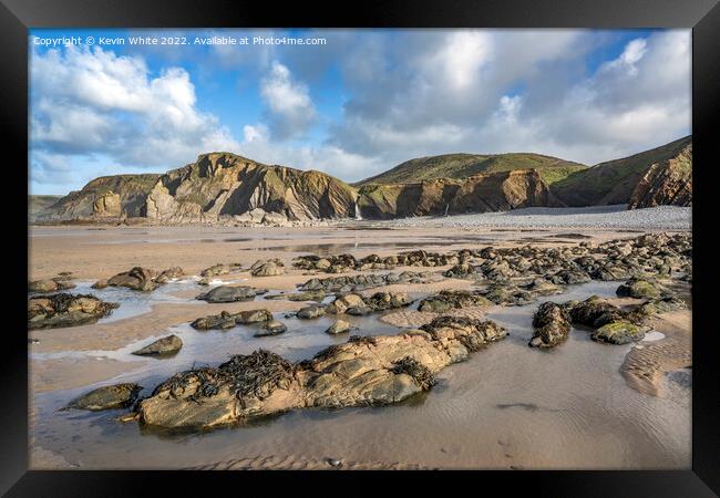 Sandymouth Bay beach and rock formations Framed Print by Kevin White