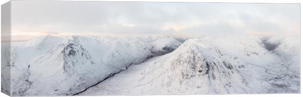 Buachaille Etive Mòr Stob Dearg mountain covered in snow aerial Glencoe Scotland Canvas Print by Sonny Ryse