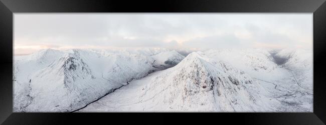 Buachaille Etive Mòr Stob Dearg mountain covered in snow aerial Glencoe Scotland Framed Print by Sonny Ryse