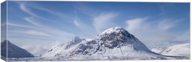 Buachaille Etive Mòr Stob Dearg mountain covered in snow aerial in Glencoe Scotland Canvas Print by Sonny Ryse