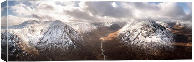 Glen Etive valley skyfall road in winter snow scottish highlands Canvas Print by Sonny Ryse