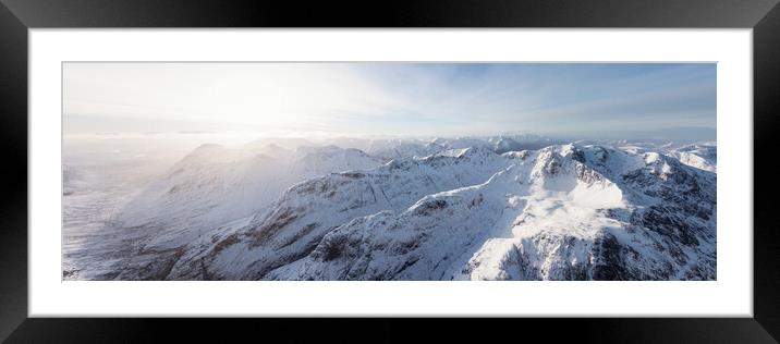 Three sisters mountains in winter snow glen coe glencoe scotland aerial Framed Mounted Print by Sonny Ryse