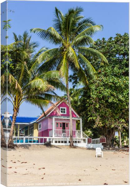 Pink Bungalow on the beach Canvas Print by Kevin Hellon