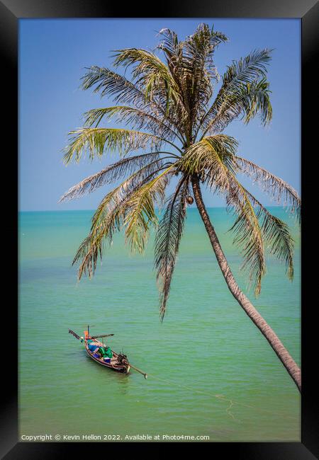 Cocnut palm and long tail boat Framed Print by Kevin Hellon