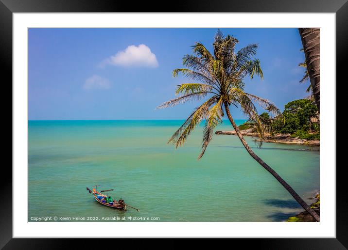 Cocnut palm and long tail boat Framed Mounted Print by Kevin Hellon