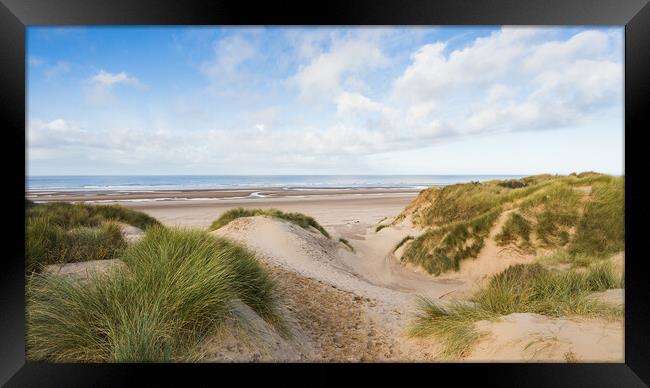 Formby beach over the sand dunes Framed Print by Jason Wells