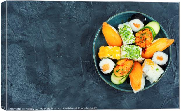 Assortment of oriental sushi roll, copy space Canvas Print by Mykola Lunov Mykola