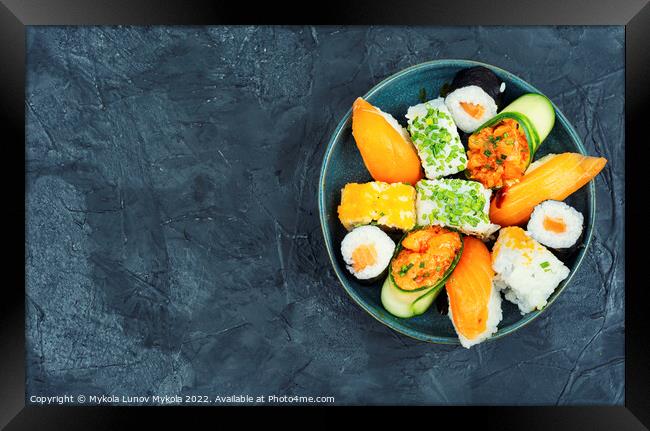 Assortment of oriental sushi roll, copy space Framed Print by Mykola Lunov Mykola