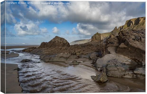 Weather worn rocks at Sandymouth Bay Canvas Print by Kevin White