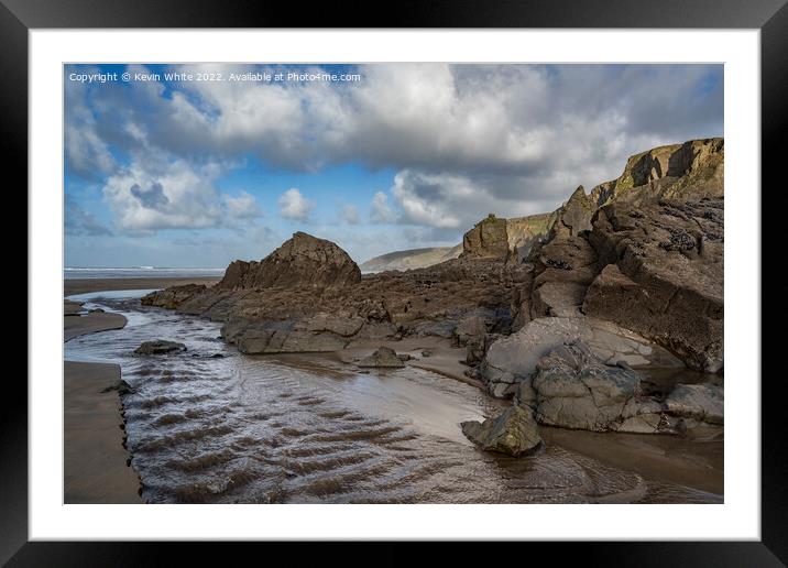 Weather worn rocks at Sandymouth Bay Framed Mounted Print by Kevin White