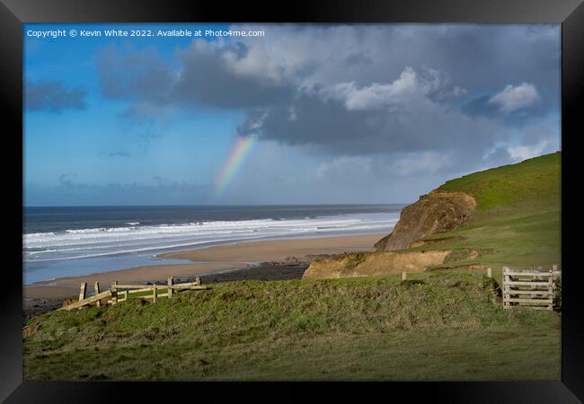 Rain and sun at Sandymouth Beach Framed Print by Kevin White