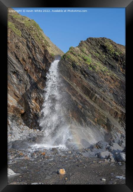 Waterfall on Sandymouth beach Framed Print by Kevin White