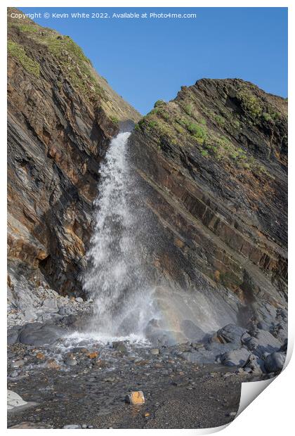 Waterfall on Sandymouth beach Print by Kevin White