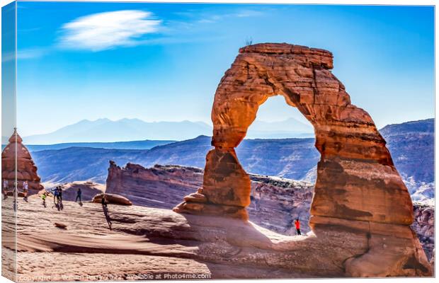 Delicate Arch Tourists Rock Canyon Arches National Park Moab Uta Canvas Print by William Perry
