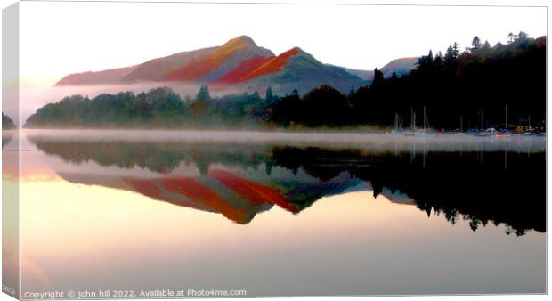 Mountain reflections at Derwentwater, Cumbria Canvas Print by john hill