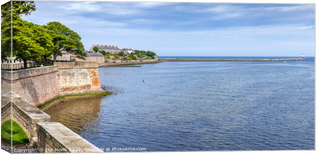 Berwick Pier and Lighthouse Canvas Print by Jim Monk