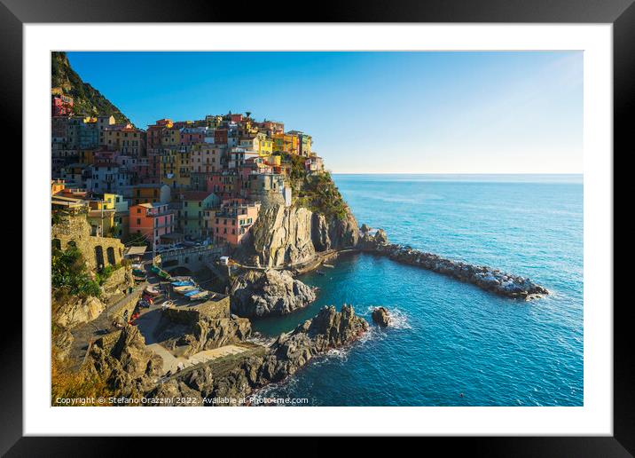 Manarola, village on the rocks, on a clear day. Cinque Terre Framed Mounted Print by Stefano Orazzini