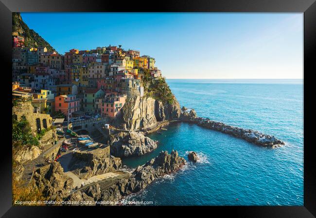 Manarola, village on the rocks, on a clear day. Cinque Terre Framed Print by Stefano Orazzini