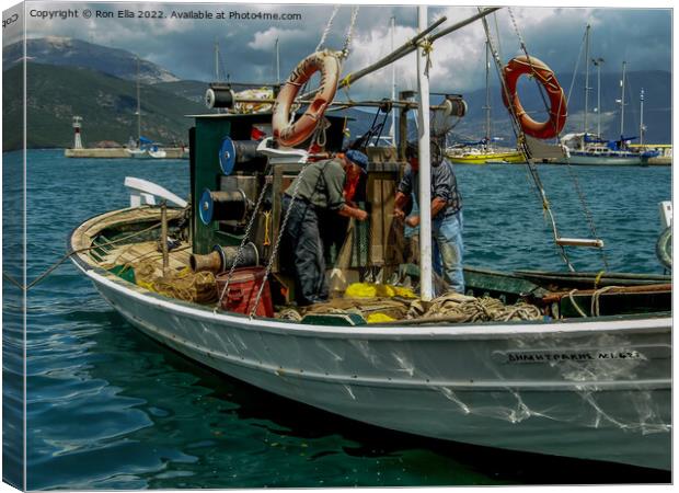 Repairing Nets by the Harbourside Canvas Print by Ron Ella