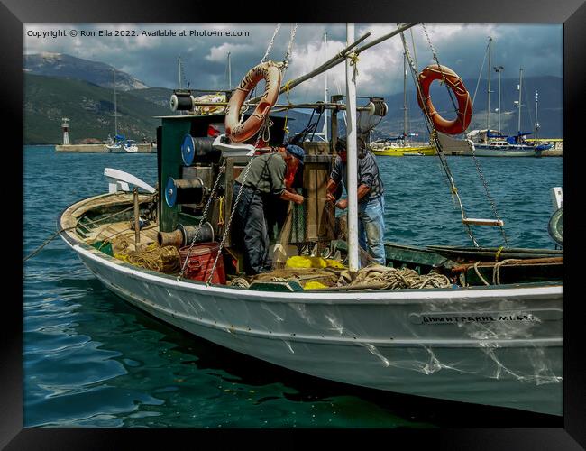 Repairing Nets by the Harbourside Framed Print by Ron Ella
