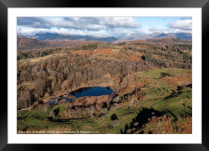 Wharton Tarn and the Langdale Pikes Framed Mounted Print by Graham Moore