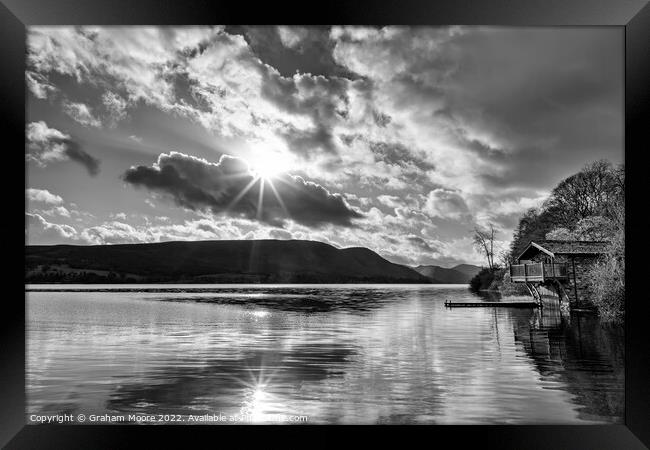 Ullswater boathouse with sun flare monochrome Framed Print by Graham Moore