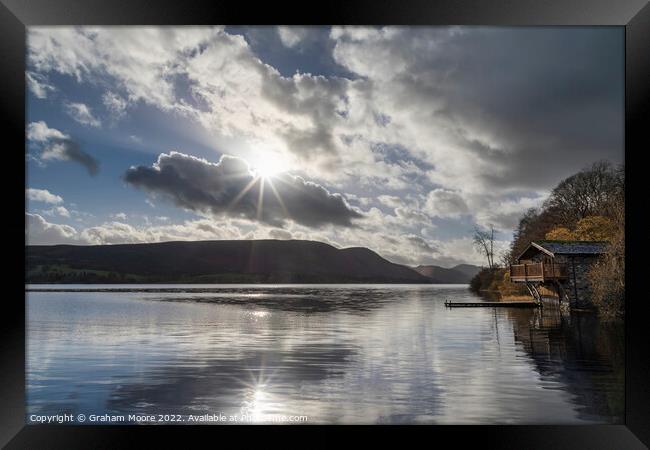 Ullswater boathouse with sun flare Framed Print by Graham Moore