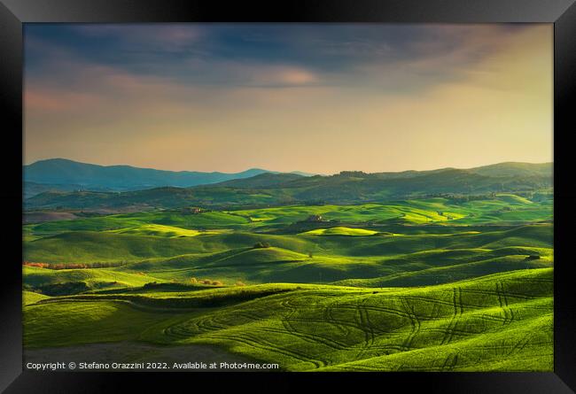 Springtime in Tuscany, rolling hills at sunset. Volterra. Framed Print by Stefano Orazzini