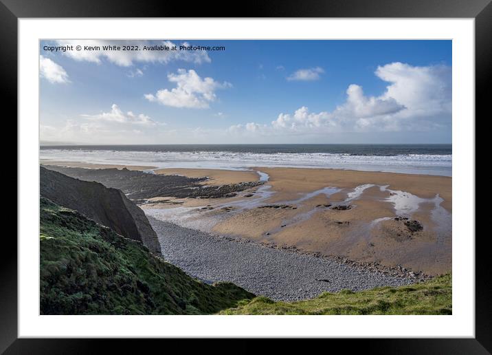 Low sunshine over Sandymouth beach Framed Mounted Print by Kevin White