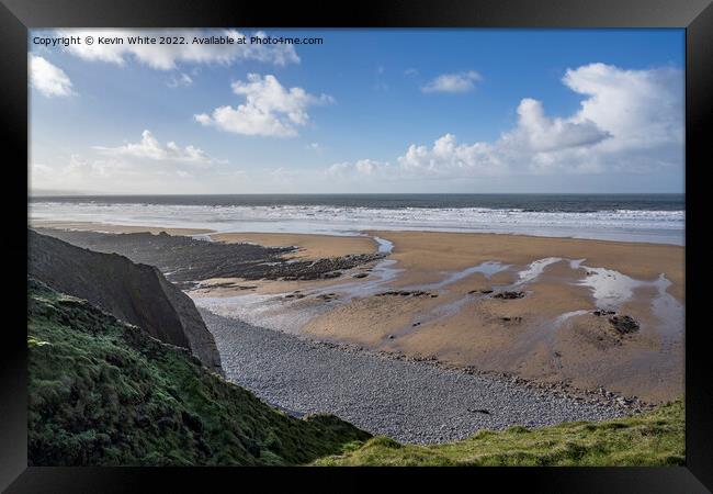 Low sunshine over Sandymouth beach Framed Print by Kevin White