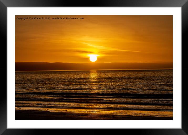 Sunset over the beach Framed Mounted Print by Cliff Kinch