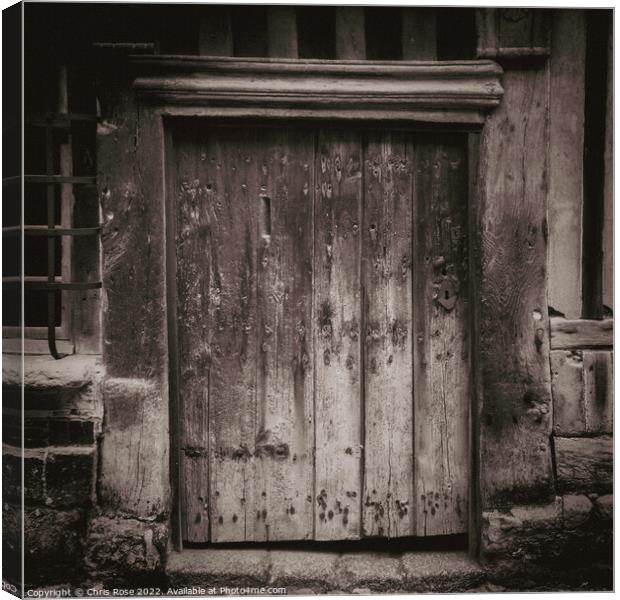 Ancient weathered wooden doorway Canvas Print by Chris Rose