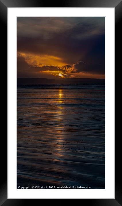 Long strands of sunset across the beach Framed Mounted Print by Cliff Kinch