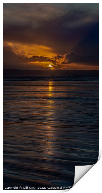Long strands of sunset across the beach Print by Cliff Kinch