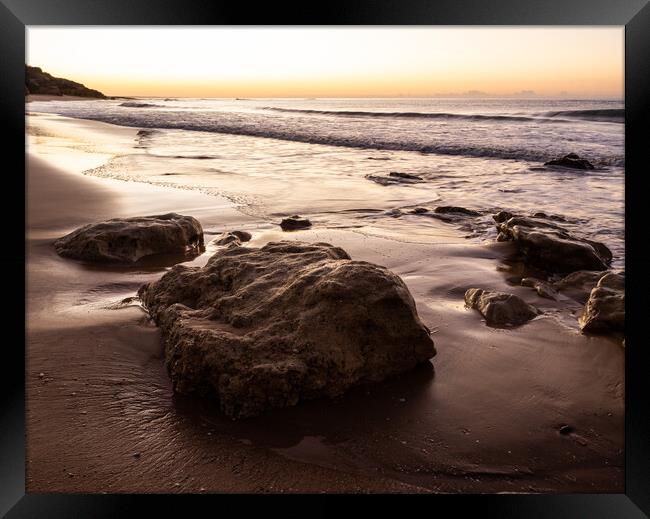 Sunrise on Oura Beach shoreline Framed Print by Tony Twyman