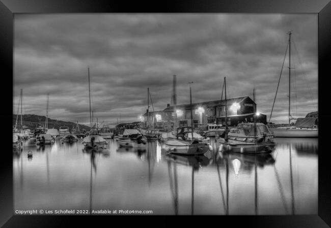 Lyme Regis harbour at night  Framed Print by Les Schofield