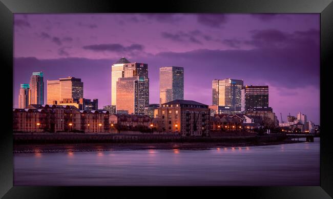 Tranquil Winter Sunset over Canary Wharf Framed Print by John Frid