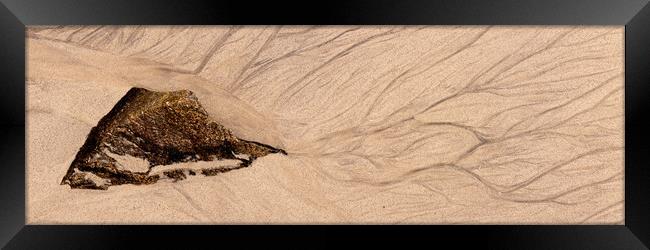 Beach sand patterns and rock Framed Print by Sonny Ryse