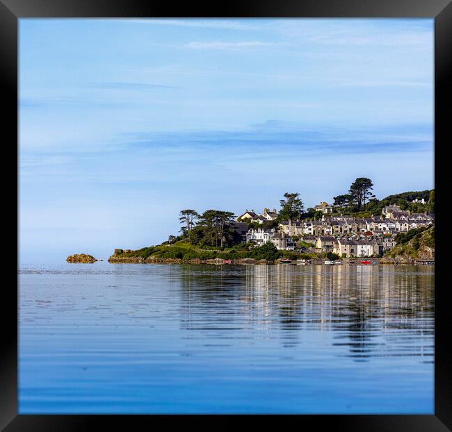 Calm early summer conditions create a pleasing reflection of the village of Borthygest. Framed Print by David Thurlow