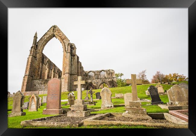 Graves in front of Bolton Abbey Framed Print by Jason Wells
