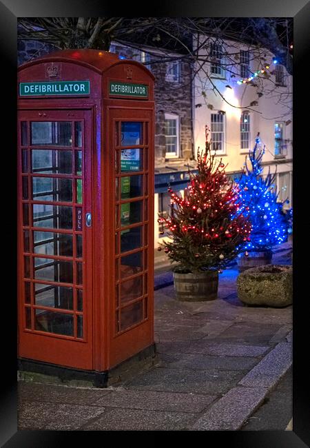 Red telephone box at Christmas Framed Print by kathy white