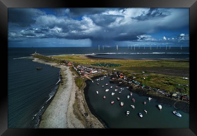 Stormy skies over South Gare Framed Print by Dan Ward