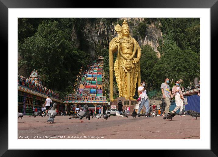 Lord Murugan statue and stairs to the Batu Caves Framed Mounted Print by Hanif Setiawan