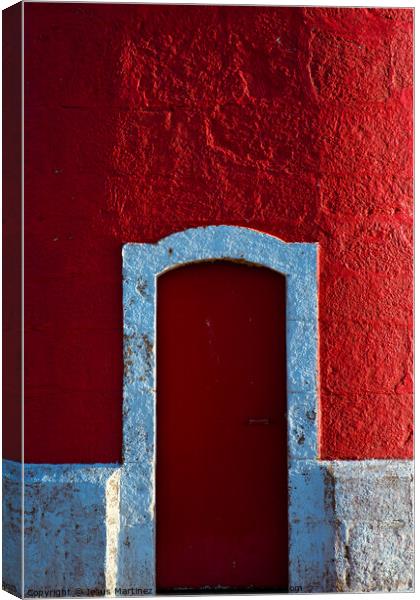 The Alluring Red Door Canvas Print by Jesus Martínez