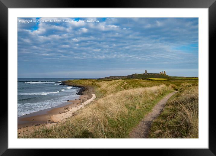 Evening stroll along path at Embleton beach Framed Mounted Print by Kevin White
