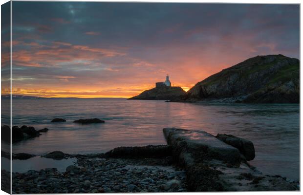 Mumbles lighthouse at day break Canvas Print by Bryn Morgan