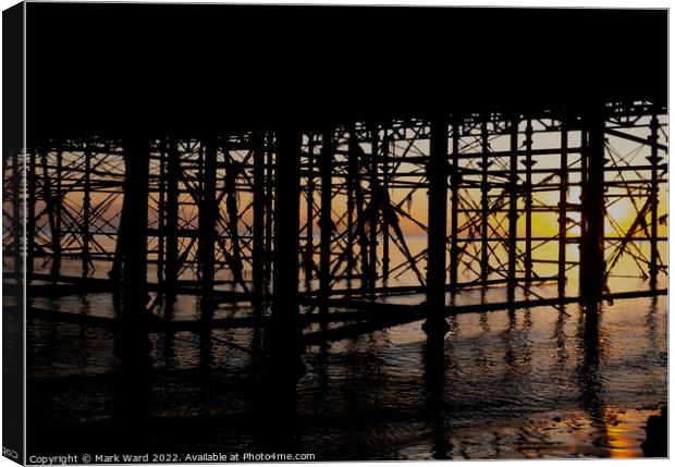 Under The Pier. Canvas Print by Mark Ward